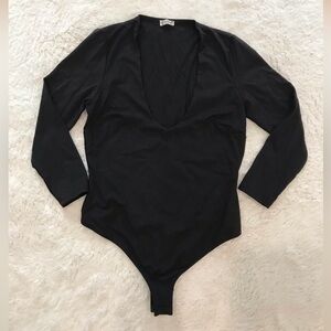 Free People Classic Black Bodysuit. Never worn.